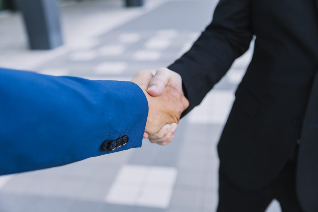 close up view handshake